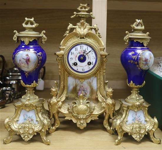 A French porcelain clock garniture